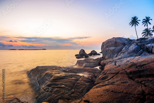 sunset on the dolphin beach, trikora, bintan island photo