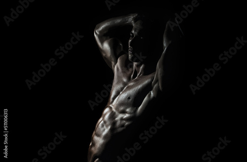 Sexy man with muscular body and bare torso. Muscular shirtless man, attractive guy. Athletic man, fitness model. Sexy torso. Male flexing his muscles. Sport workout bodybuilding.