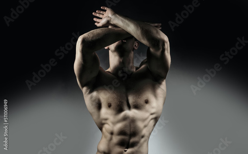 Sexy male model body, nude torso. Sexy naked man, seductive gay. Muscular shirtless man, attractive guy. photo