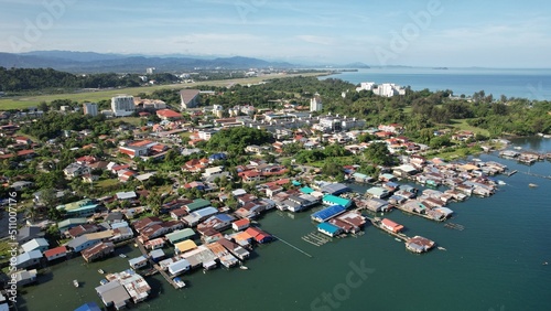 Kota Kinabalu, Sabah Malaysia – June 15, 2022: The Tanjung Aru Beach, Fisherman Village and Shangri-La Hotel © Aerial Drone Master