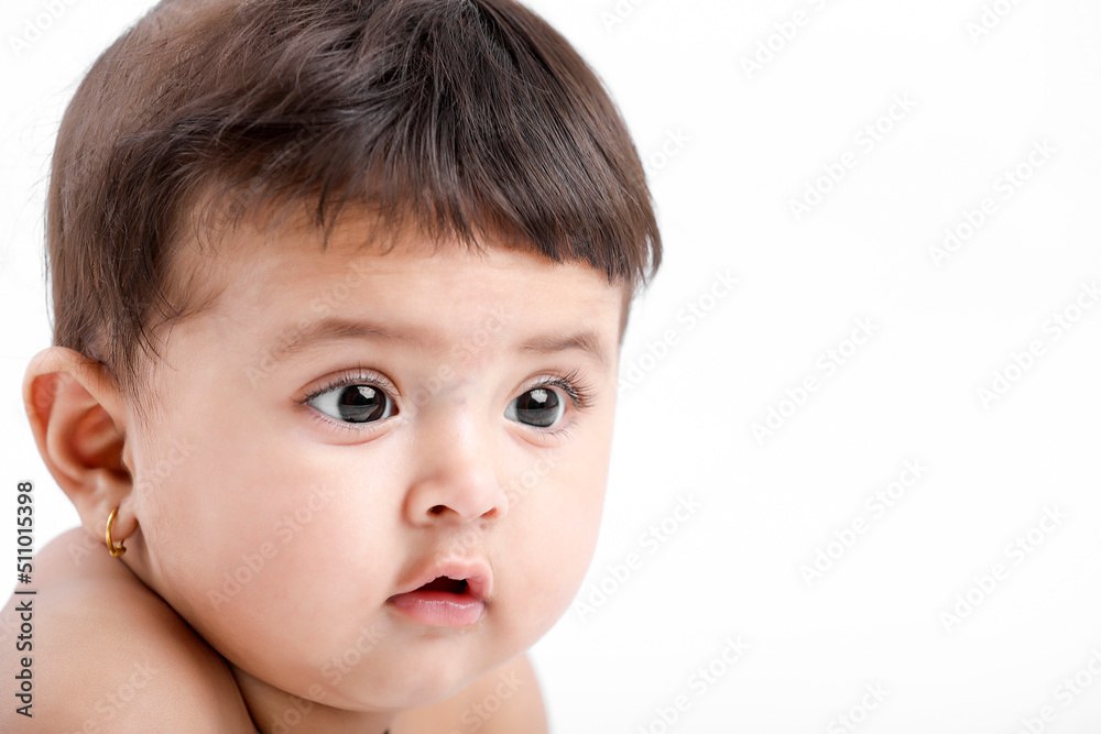 Indian baby girl playing on white background. Indian baby girl playing on white background.