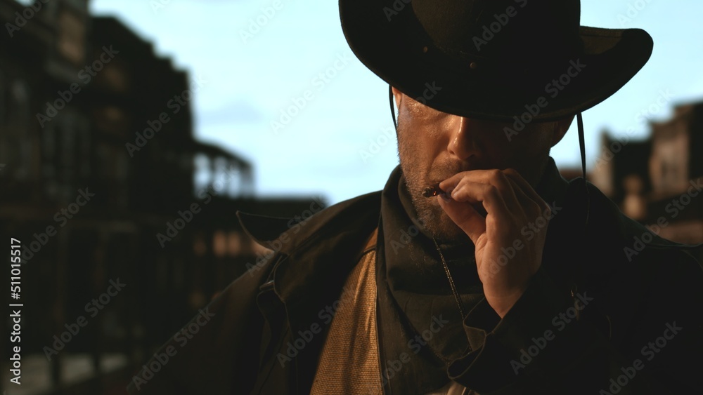 Portrait of cowboy smoking a cigar, old wild west city in the background. Spaghetti, macaroni western style cinematic footage - obrazy, fototapety, plakaty 