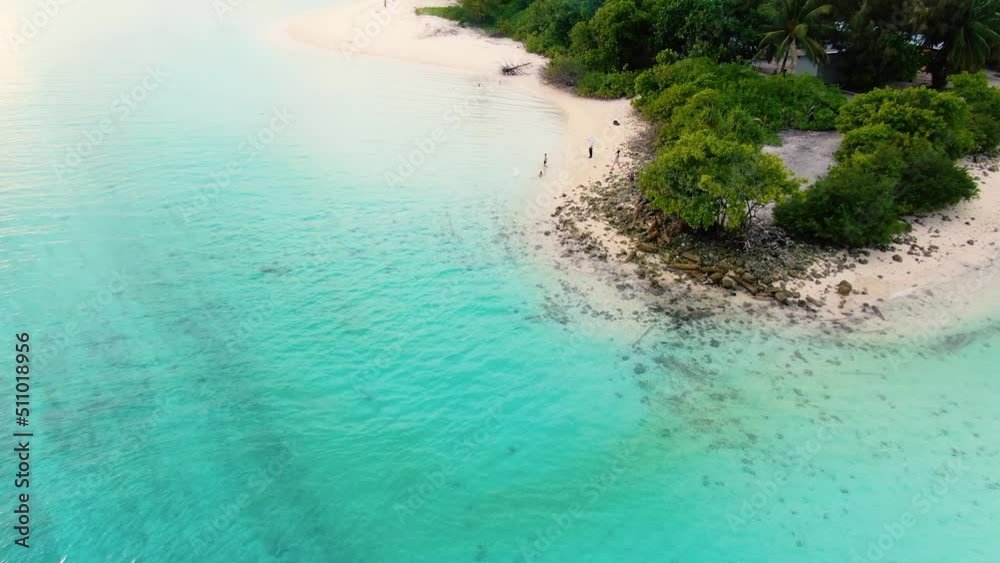 Drone flyuing along Maldive paradise tropical island Drone flyuing along Maldive paradise tropical island