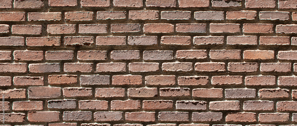 Fototapeta premium Aged brick wall texture. Seamless background pattern.