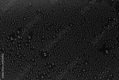 Water droplets on black background. Water drops on black background.