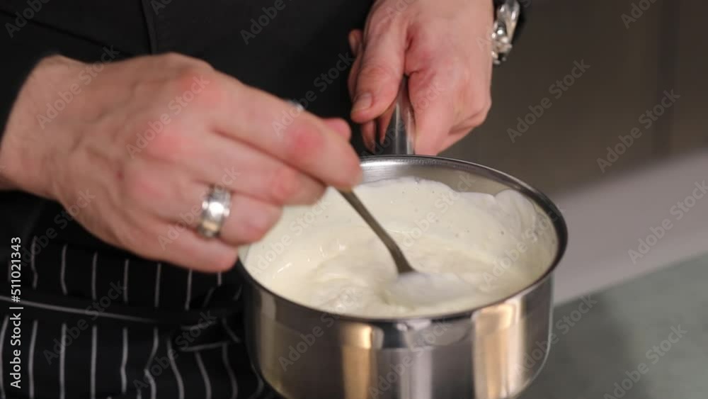 chef preparing tasty food on kitchen table chef preparing tasty food on kitchen table