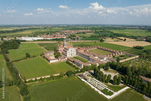 Aerial view of the Certosa di Pavia at sunny day, built in the late fourteenth century, courts and the cloister of the monastery and shrine in the province of Pavia, Lombardia, Italy © robertobinetti70