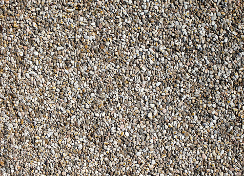 Small pebbles of crushed stone as an abstract background.