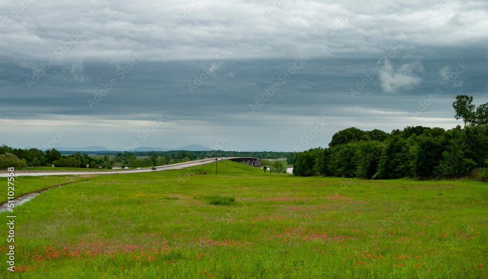 Oklahoma scenery with bridge, mountains and wildflowers