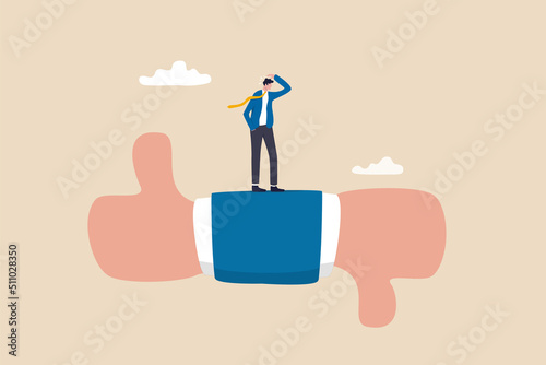 Performance evaluation, customer feedback or business decision making, customer satisfaction, opinion or service quality concept, thoughtful businessman thinking on thumb up and thumb down feedback.