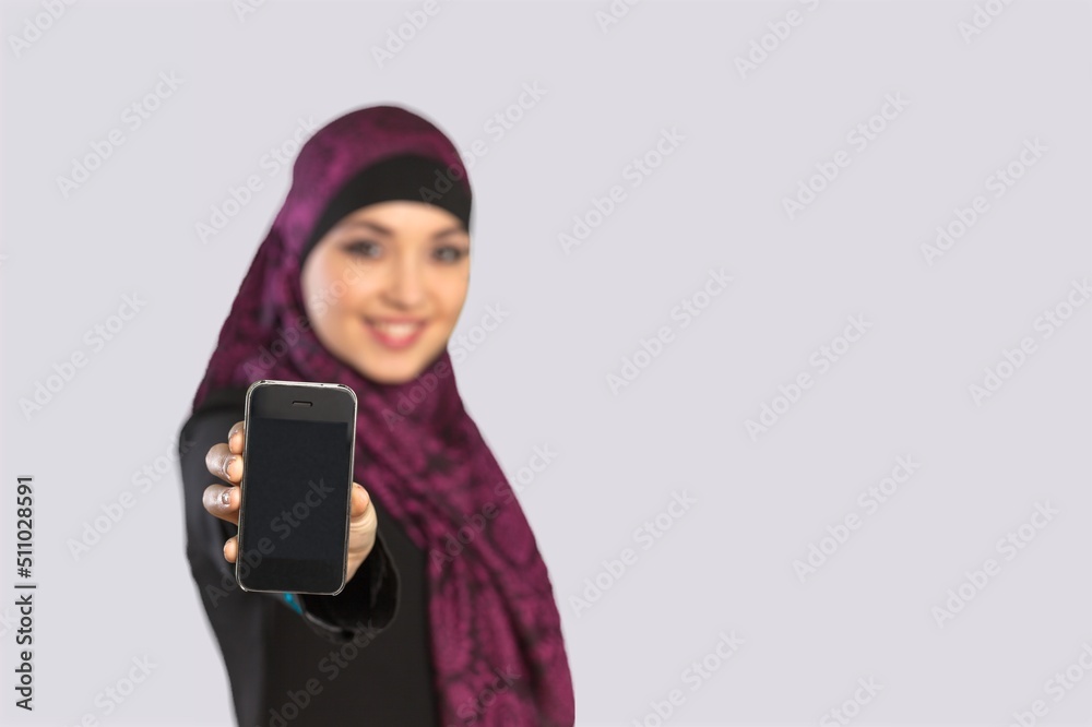 Smiling young woman using a mobile phone, received good news Smiling young woman using a mobile phone, received good news