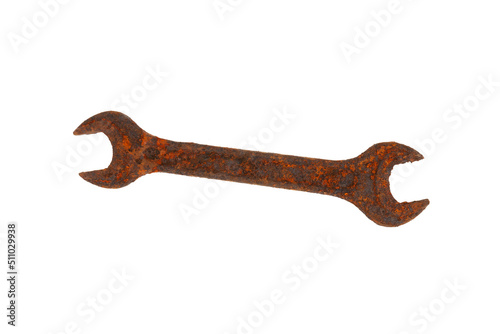 An old rusty wrench isolated on white background. Design element. Concept of Evolution