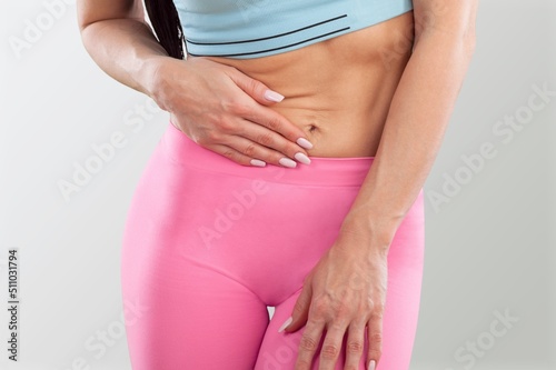 Wallpaper Mural Woman with stomach pain causes of abdominal pain include inflammatory bowel disease. stomach ulcer irritable bowel syndrome, ulcerative colitis and microvilli. Torontodigital.ca