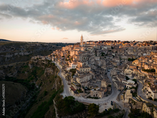 View from above, stunning aerial view of the Matera’s skyline during a beautiful sunrise. Matera is a city on a rocky outcrop in the region of Basilicata, in southern Italy.