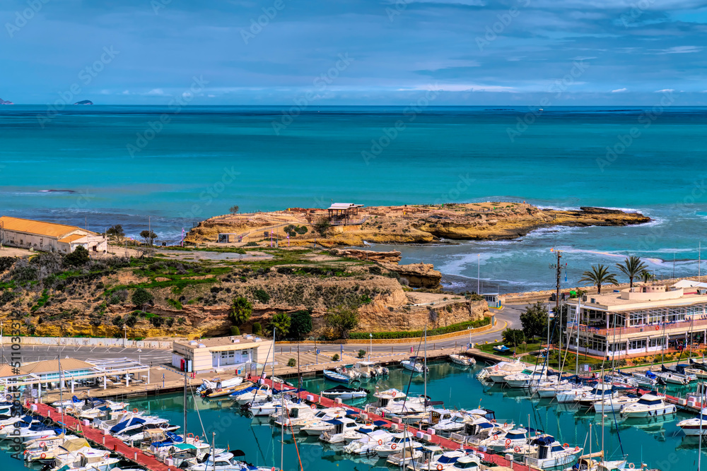 Fototapeta premium El Campello Spain marina and boats with la Illeta in background Costa Blanca coast