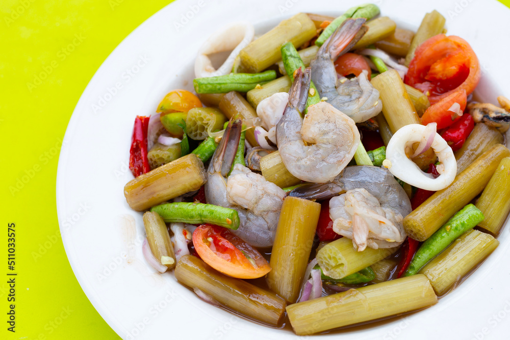 Lotus stem spicy salad with seafood. Thai food recipes Lotus stem spicy salad with seafood. Thai food recipes