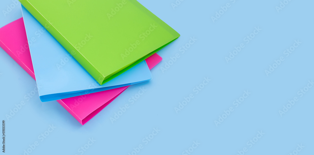 Office folders on blue background.