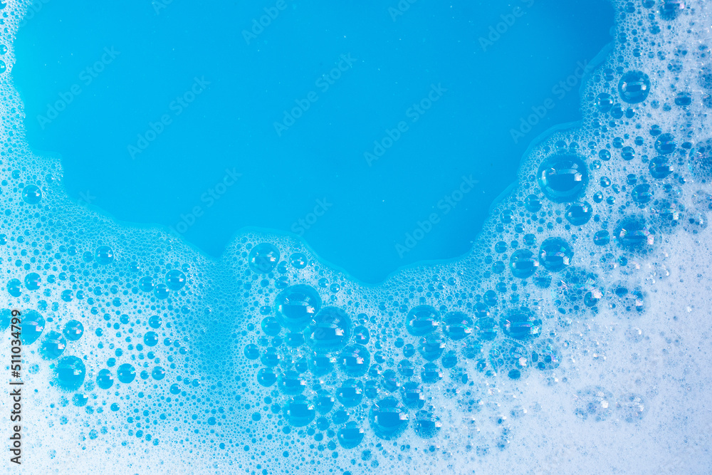 Detergent foam bubble on blue background. Detergent foam bubble on blue background.