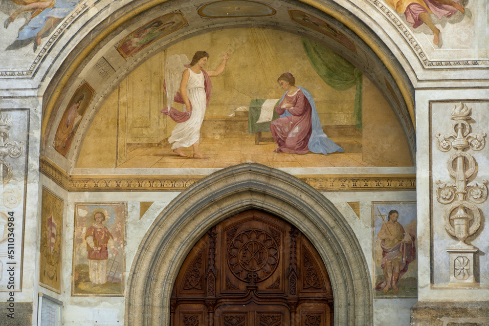 religious painting at the entrance to the Collegiate church of Saint-Laurent in Estavayer-le-Lac, switzerland
