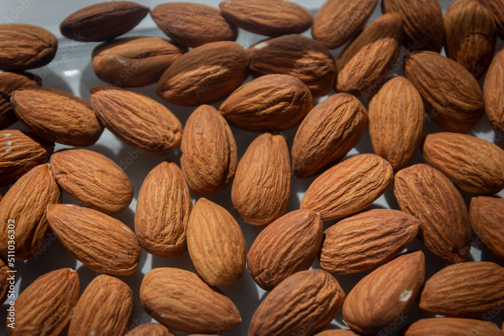 Almonds, the background of raw almonds Almonds, the background of raw almonds