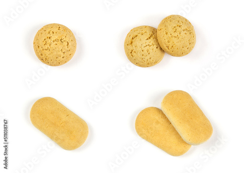 Oatmeal round and wheat oblong baby cookies on a white isolated background. Children's sweets, a template for design.