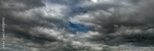 Obraz na plátně Dramatic sky with dark clouds. Dark rain clouds