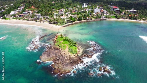 Wallpaper Mural Parrot Rock Hill washed by Indian ocean waves flying drone beautiful Nature's landmark 4K video in Mirissa, Matara District on Sri Lanka. Exotic Asian countries and around the World traveling concept Torontodigital.ca