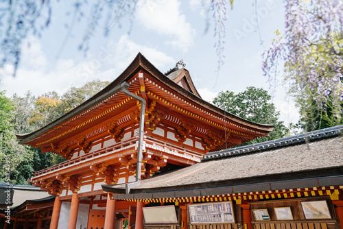 exterior of the famous orange religious building of Kasuga Taisha shrine in nara, japan, on sunny day. architecture photography concept.