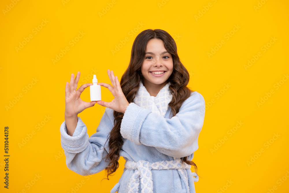 Happy child holds a medicine. Sick teen girl snuffle struggle with virus symptoms, have runny nose. Smiling teenager girl, pharmacy concept. Happy child holds a medicine. Sick teen girl snuffle struggle with virus symptoms, have runny nose. Smiling teenager girl, pharmacy concept.