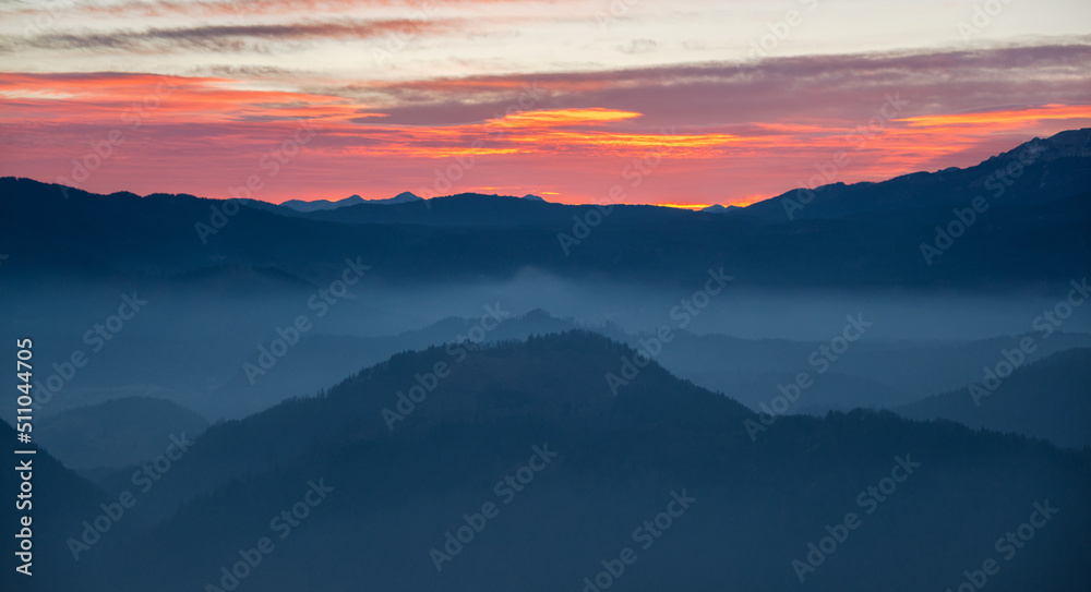 Dark and vivid sunset in the mountains