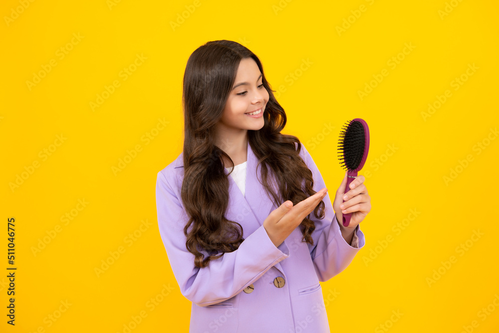 Teen girl girl with brush combing hair. Girl taking haircare and hairstyle. Hairdresser hair solon for teenager. Happy face, positive and smiling emotions of teenager girl. Teen girl girl with brush combing hair. Girl taking haircare and hairstyle. Hairdresser hair solon for teenager. Happy face, positive and smiling emotions of teenager girl.