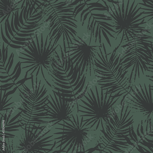 Stamped tropical leaves seamless pattern. Shaded jungle grunge flora trend. Abstract botanical background. Palm branches fashion print for fabric, package, paper