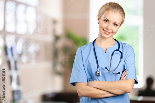 Portrait of young doctor working in a hospital. With Stethoscope In Hospital Office.