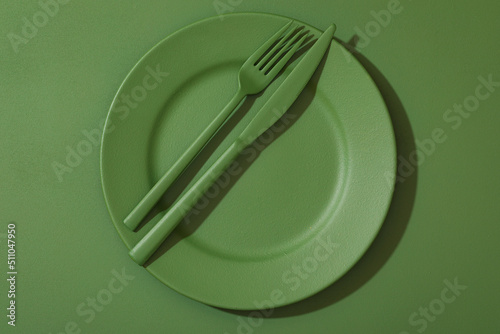 Wallpaper Mural Fork and knife on the plate. All painted in green. Background painted in the same green color. Torontodigital.ca