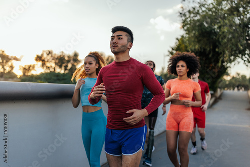 Fit young runners training outdoors