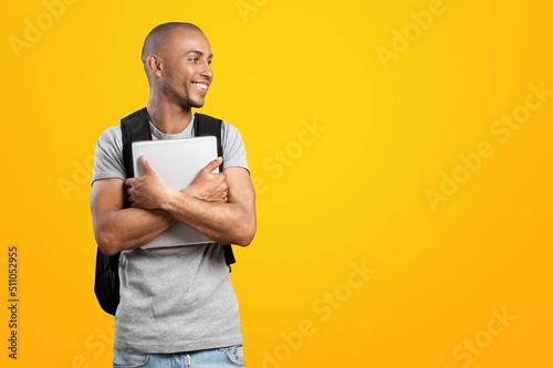 Overjoyed excited man posing while looking at camera