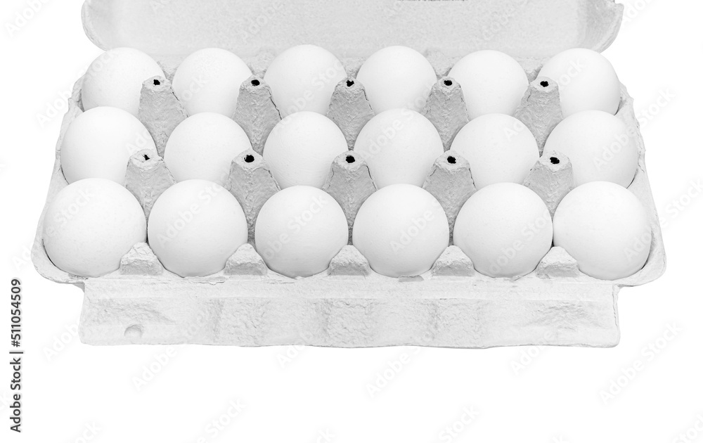Fototapeta premium Chicken eggs in a cardboard box on a white background.