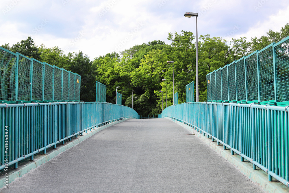 KRAKOW, POLAND - JUNE 14, 2022: A pedestrian bridge in Krakow, Poland.