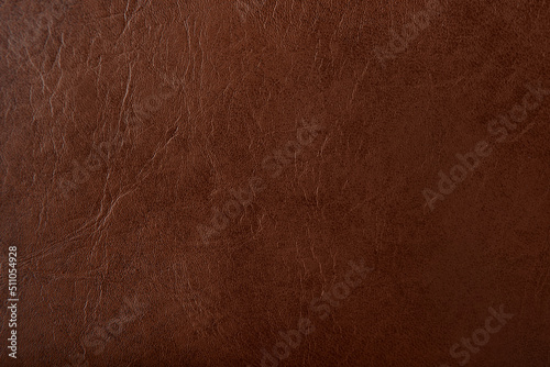 Empty Creased or cracked dark Brown color leather with strong material texture fashionable background to be use for accessories outfits or packaging