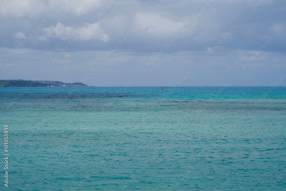 Seascape of Miyako Island with many layers of changing colors