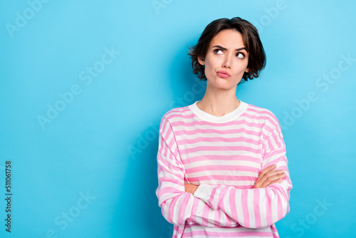 Fotografie Photo of young serious charming girl look empty space contemplate solve thinking