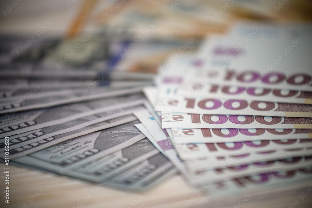 Dollar banknotes of the USA. Amerikan dollars. Money of USA and Ukrainian hryvnia. 1000 Ukrainian hryvnia Dollar banknotes of the USA. Amerikan dollars. Money of USA and Ukrainian hryvnia. 1000 Ukrainian hryvnia