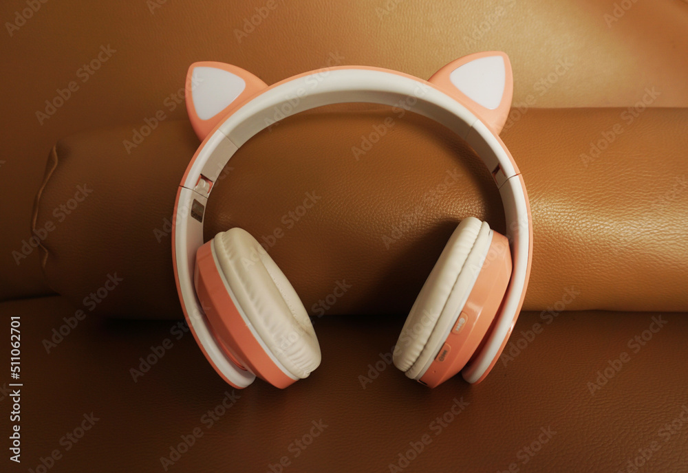 custom made wallpaper toronto digitalPink and white headphones on colored background. Music concept.            