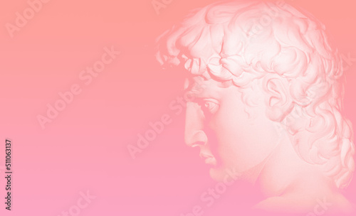 Head of Michelangelo's David Sculpture isolated in neon pink lighting. 3D illustration. Classical sculpture in vaporwave retrofuturistic style. © yuliana_s