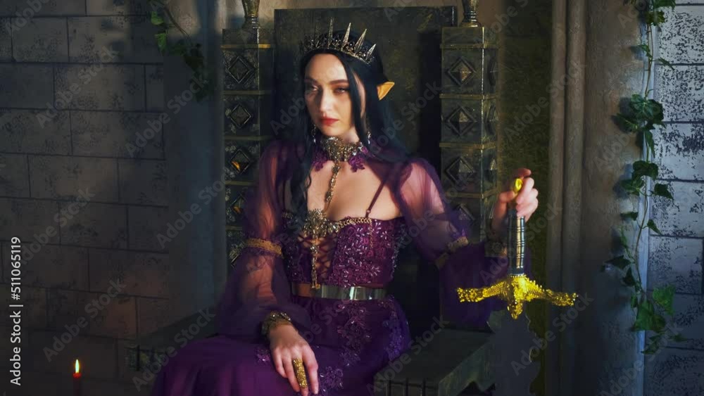 Art fantasy fairy woman evil elven queen sits on throne, dark magic purple long dress. Sexy witch elf girl, pointy ears. Gothic Brunette vampire princess, golden crown. Old style night room full smoke