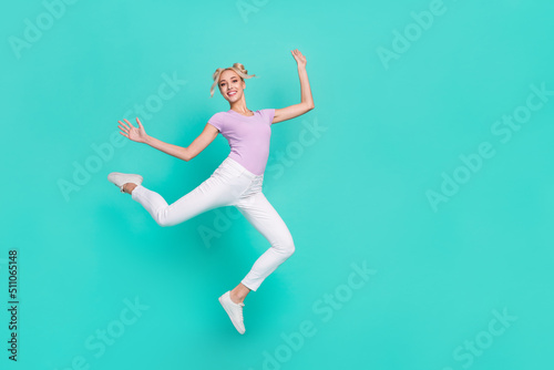 Full length body size view of attractive cheerful flexible sportive girl jumping dancing isolated over teal turquoise color background