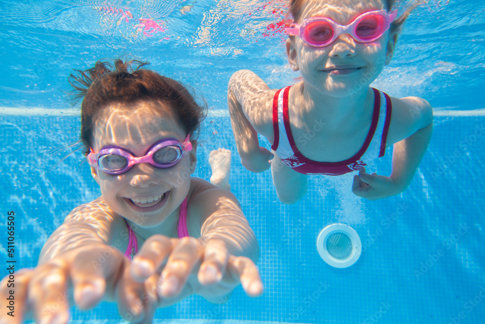 girls swiming in pool