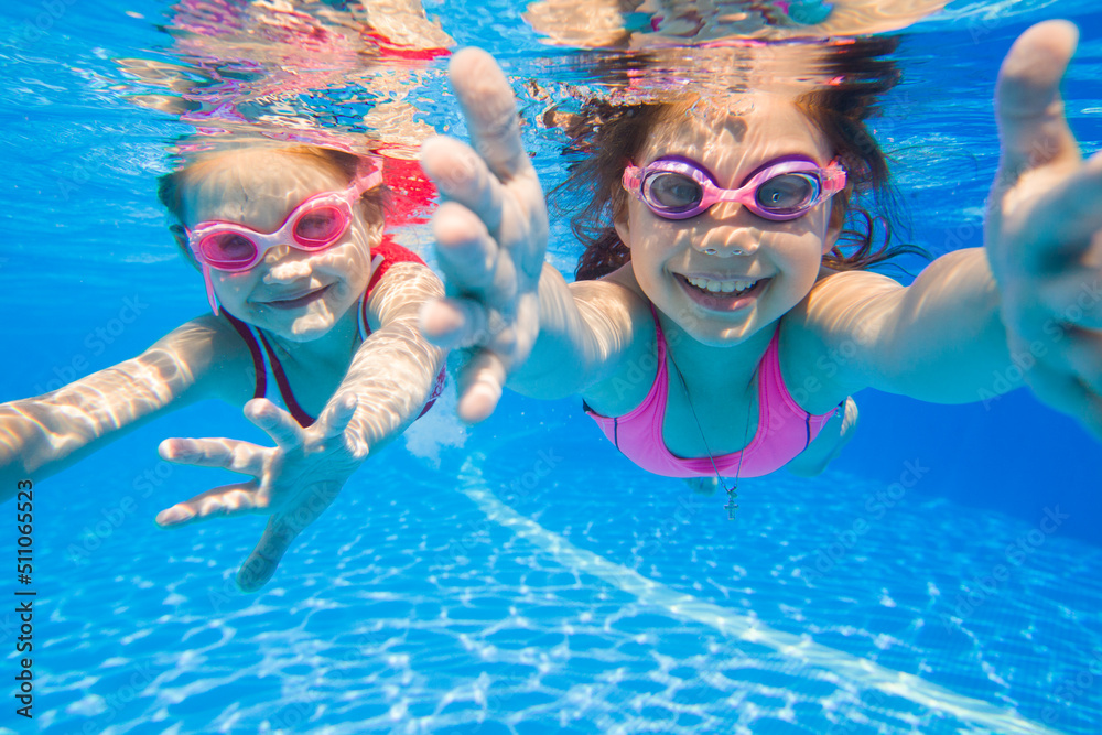 girls swiming in pool