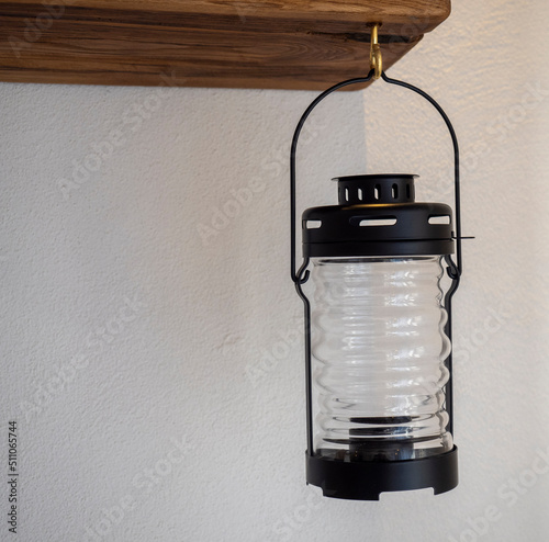 Old fashioned lantern in a house photo