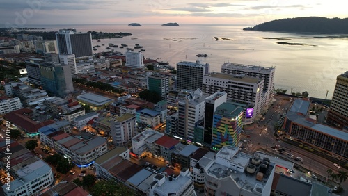 Kota Kinabalu, Sabah Malaysia – June 14, 2022: The Waterfront and Esplanade Area of Kota Kinabalu City Centre photo